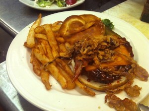 A little something to whet the appetite—GLBC's Old World Burger with smoked cheddar, bacon, fried onion straws, and housemade Edmund Fitzgerald Porter barbecue sauce on a pretzel roll.